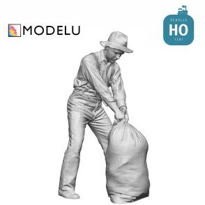 Ouvrier qui déplace un sac HO Modelu 14202-087 - Maketis